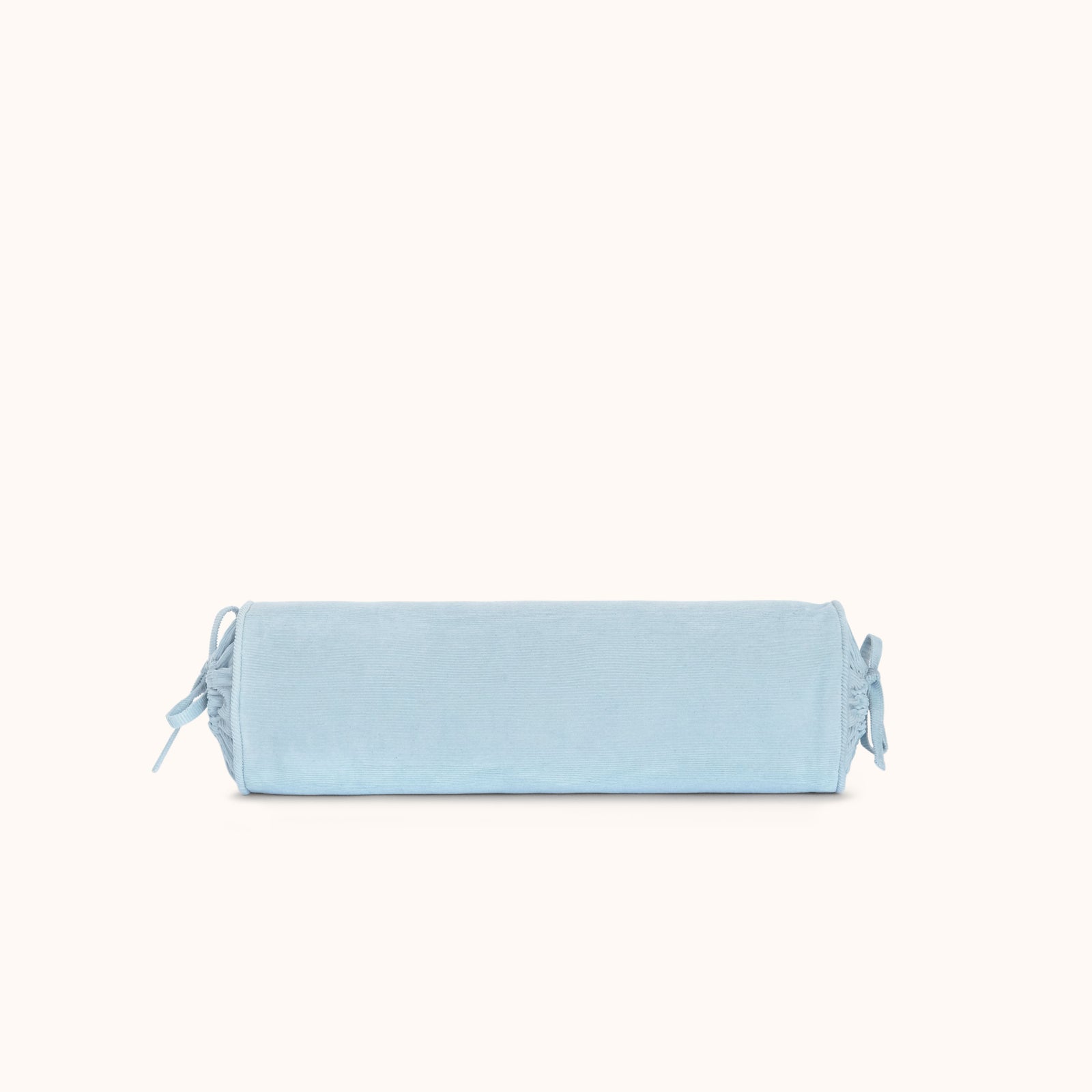 A light blue cylindrical bolster pillow with drawstring ties on both ends, shown against a solid off-white background.