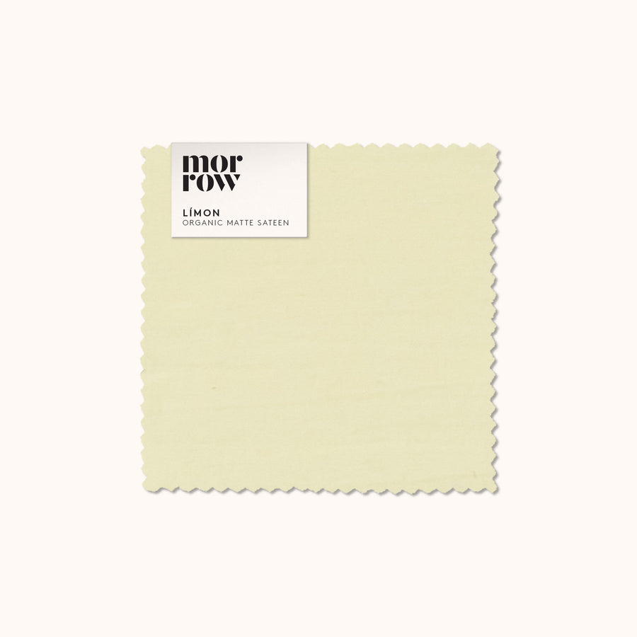 An organic matte sateen Límon fabric swatch with a Morrow label