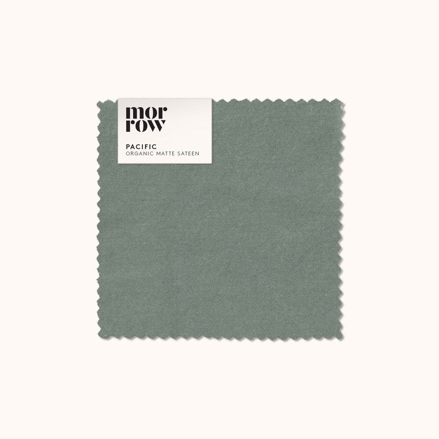 An organic matte sateen Pacific fabric swatch with a Morrow label