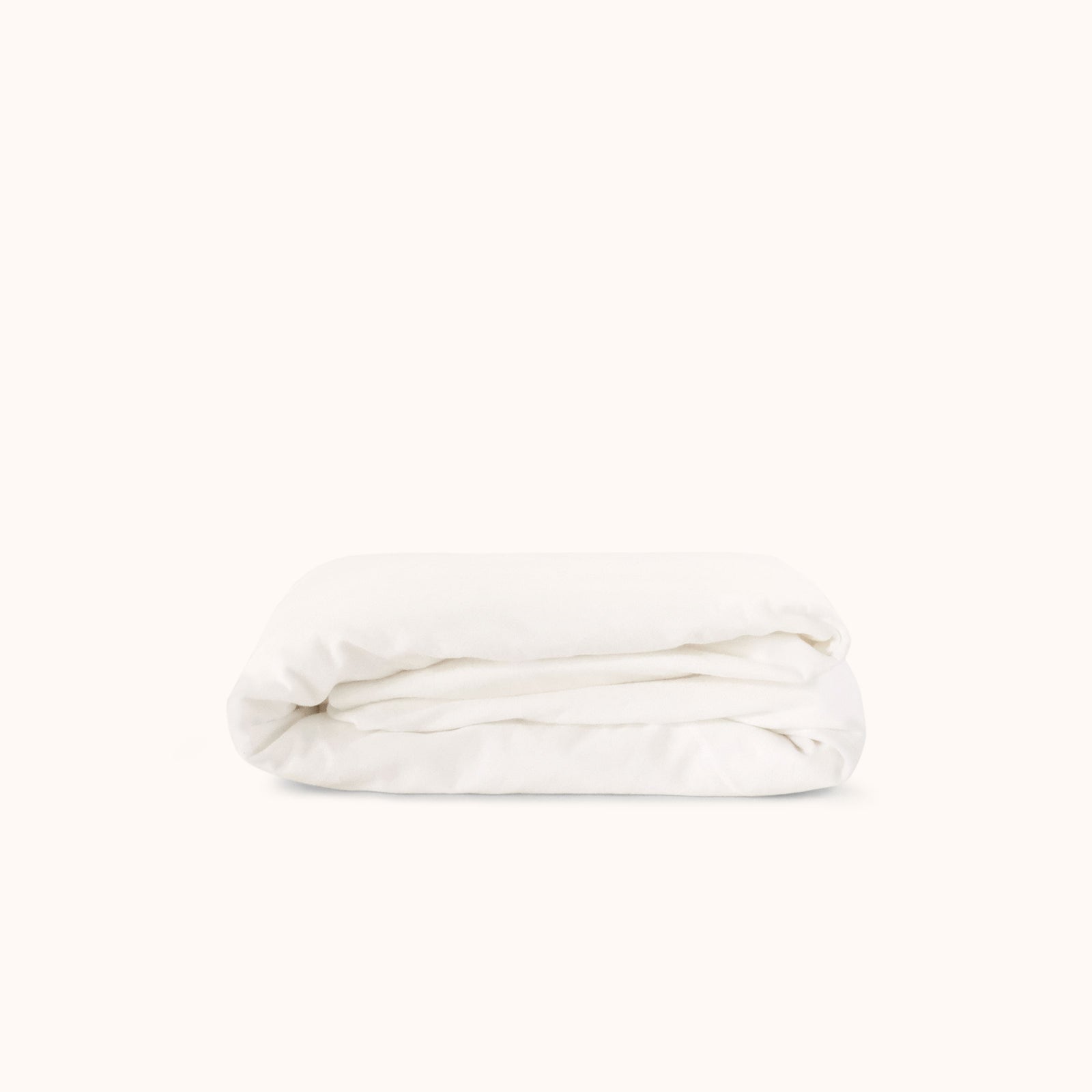 White fitted sheet on a white background