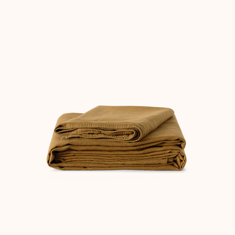 brown folded sheet on white background